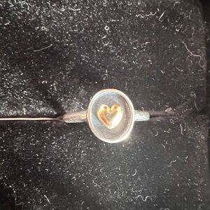 Sterling silver with 18k gold heart ring
